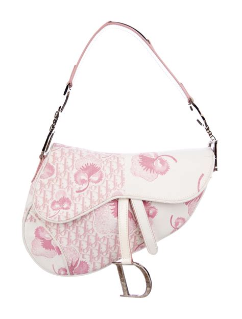 dior saddle bag pink|Dior pink canvas saddle bag.